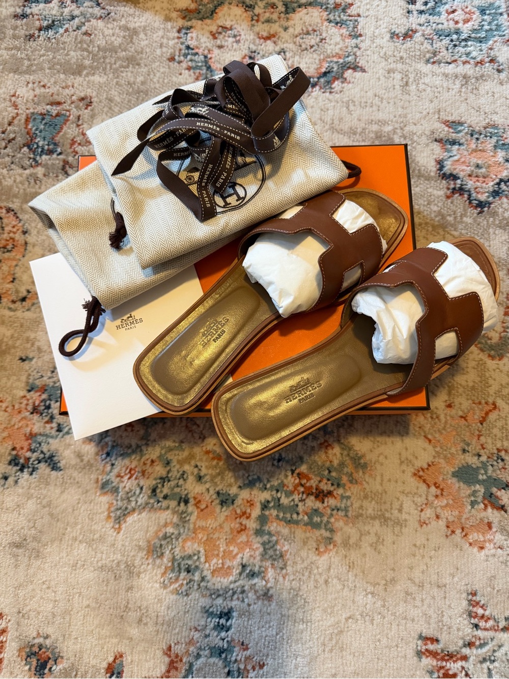 Hermès Oran Leather Slide Sandals in Gold
